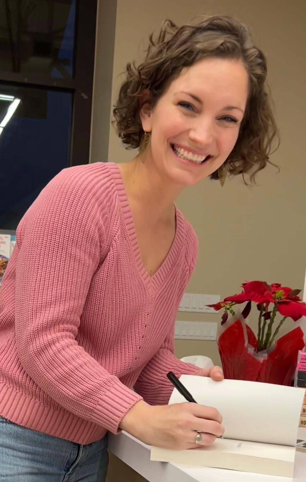 Meghan Joyce Tozer signs copies of NIGHT, FORGOTTEN.